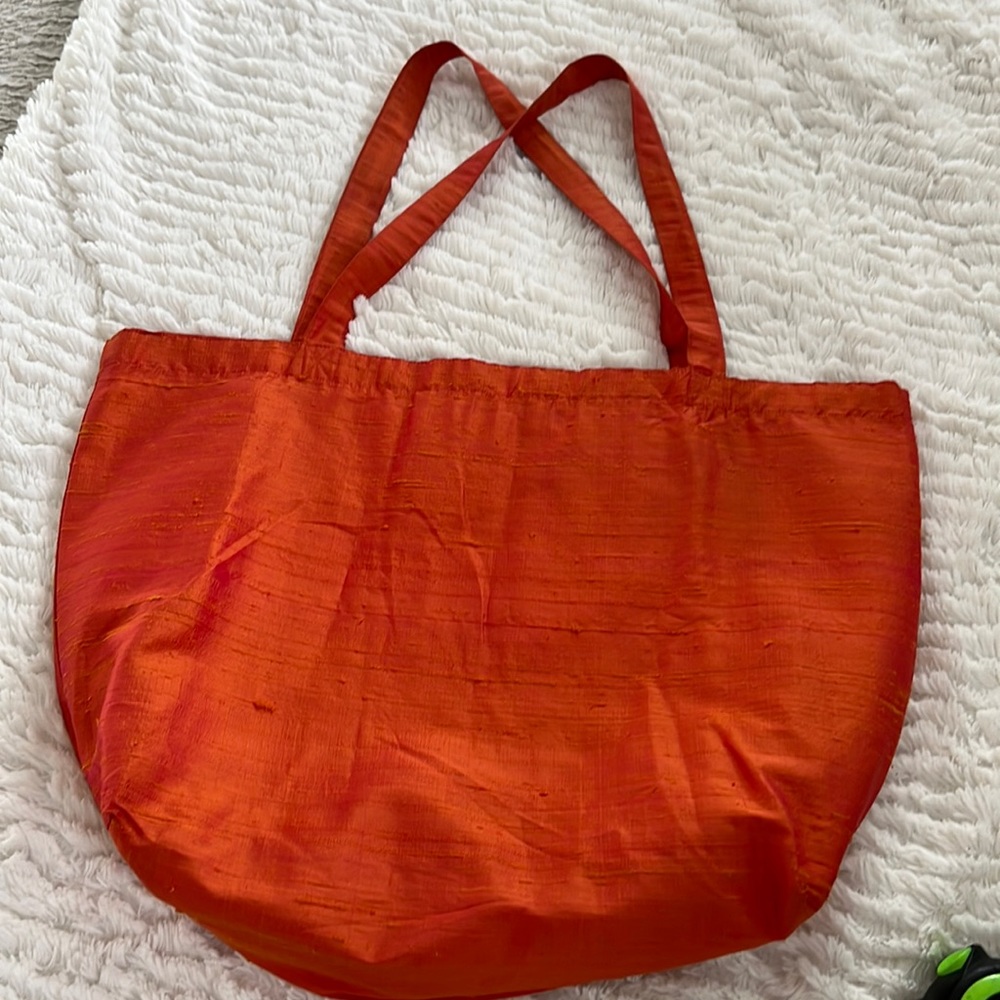 Orange silk tote with 2 inside pockets